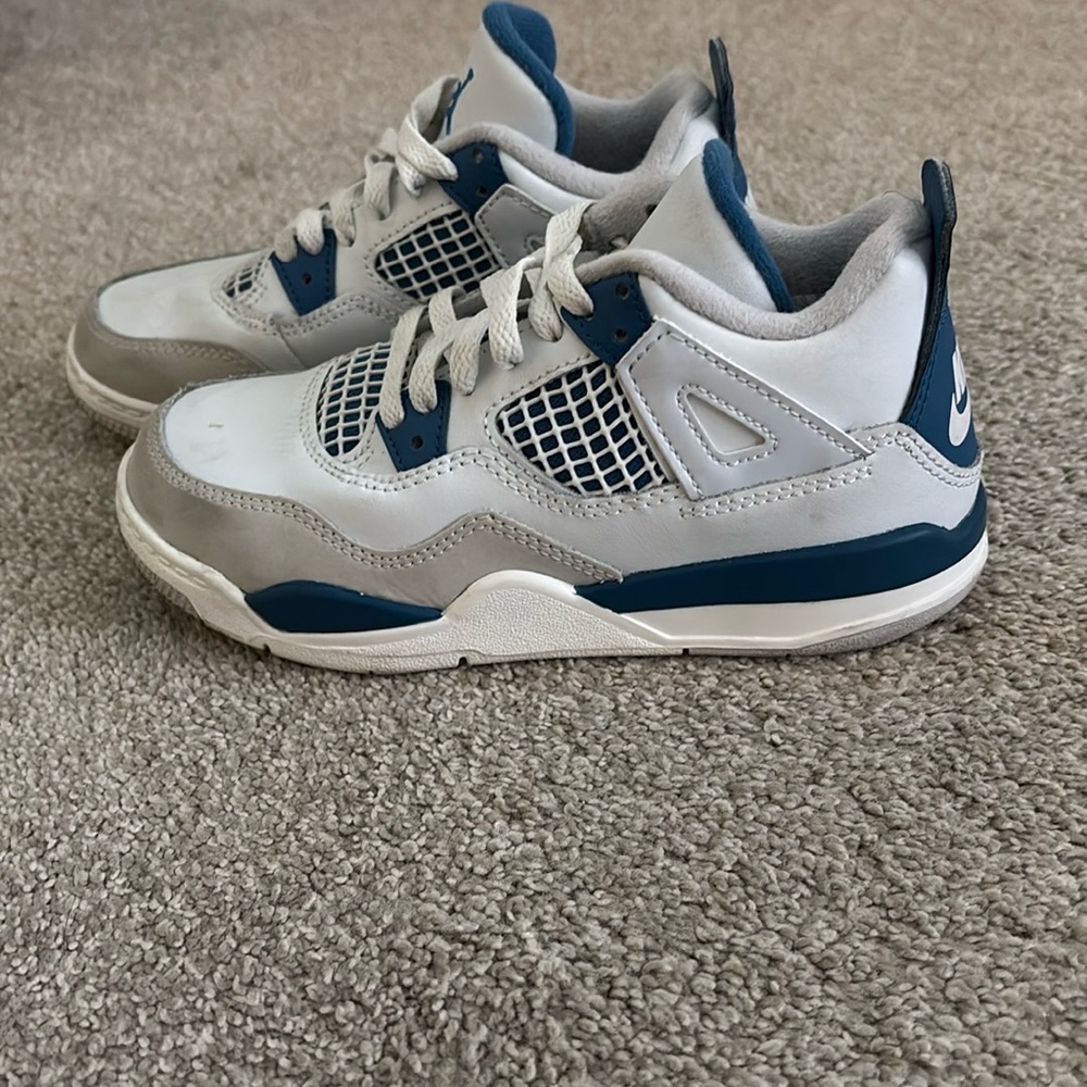 Nike Blue and White Sneakers with Iconic Design